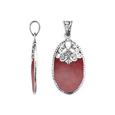 Sterling silver oval pendant with vibrant red coral inlay and delicate Balinese filigree design, handcrafted in Bali.